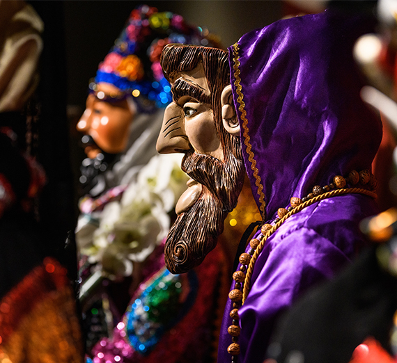 Pavel Shlossberg with some Mexican masks at the Northest Museum of Arts and Culture